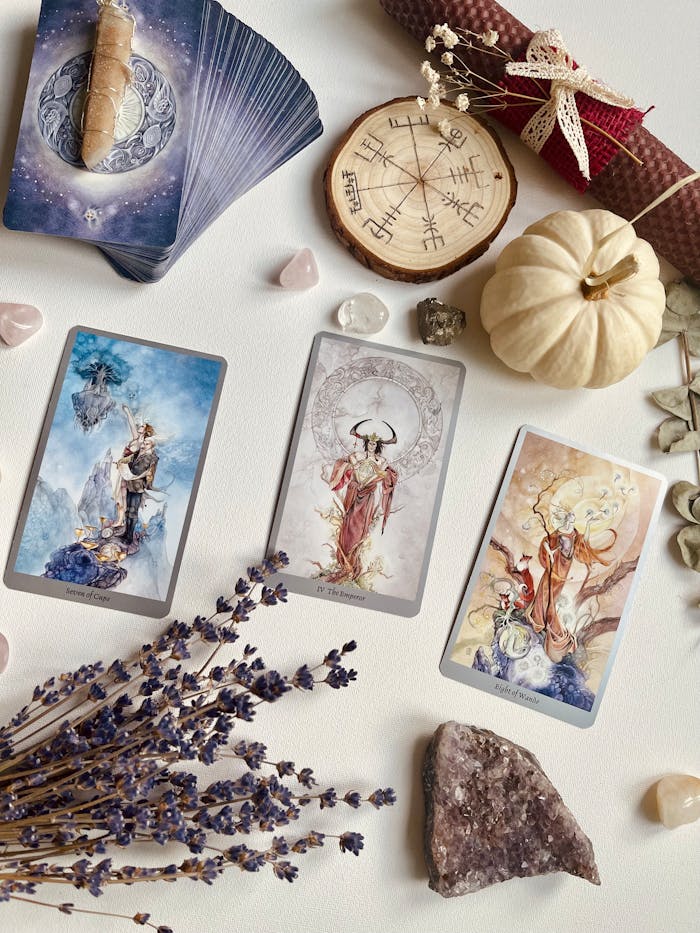 View of Tarot Cards, Flowers and Crystals Lying on a Table